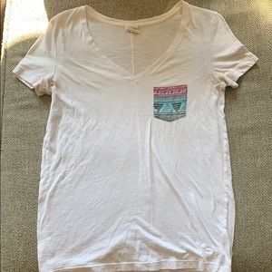 plain tee with a graphic pocket